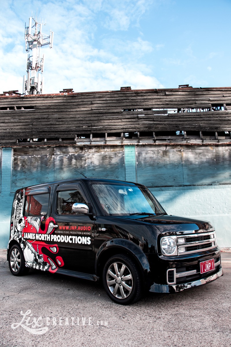 JNP Nissan Cube Z-11 Cubic Rider with custom artwork wrap by Lix Creative